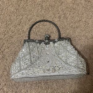 Silver beaded clutch